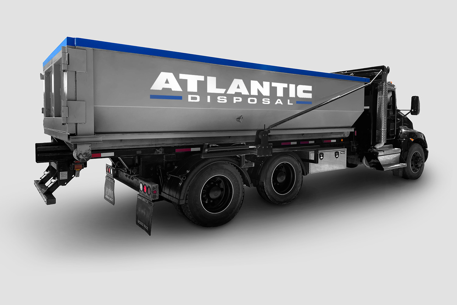 Atlantic Disposal roll-off dumpster rental delivery truck